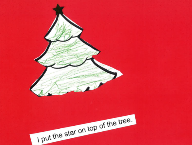Christmas tree colored by the student with a star on the top. The sentence under it says, "I put a star on the top."