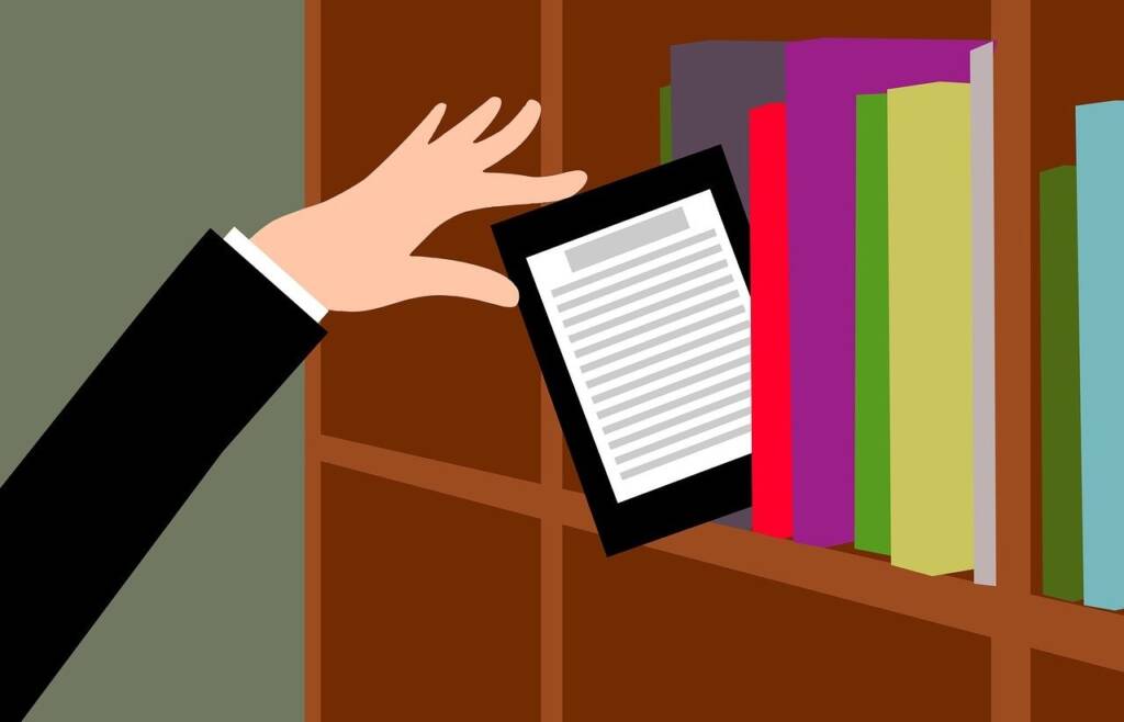 Illustration of a hand pulling out an electronic reading device from a shelf of books.