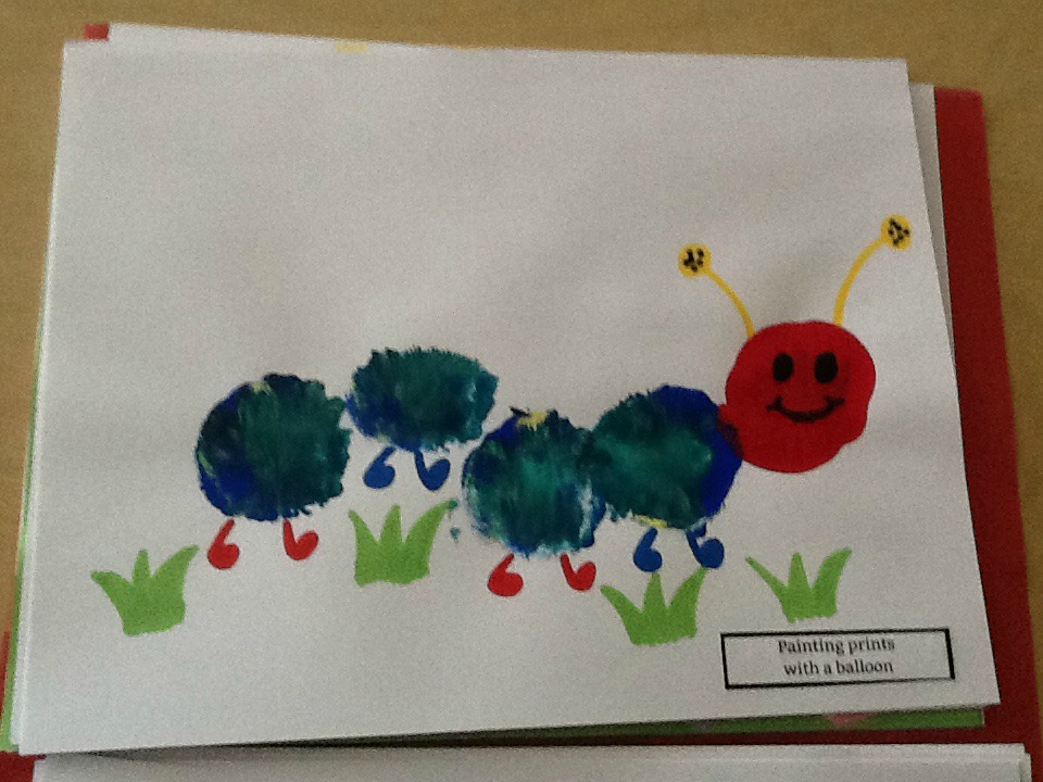 Painting of caterpillar made with balloon prints