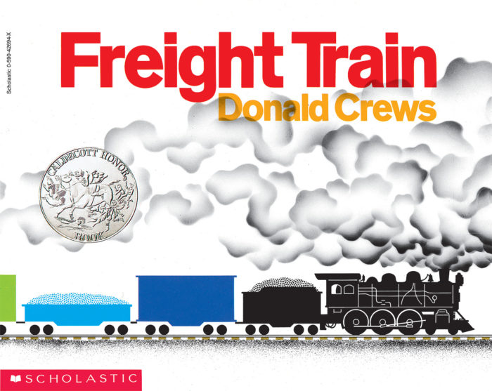 The cover page for the book Freight Trains. Shown is a cartoon train on a track with a large cloud of steam coming out from the top of the train.
