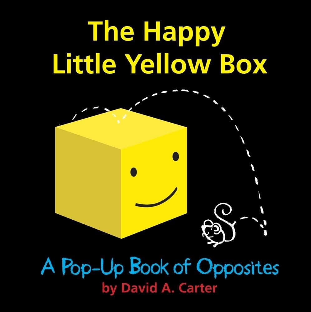 The cover page of the book The Happy Little Yellow Box. Shown is a yellow box with a smiley face on it, and a small mouse that jumped off of the top of the box. 