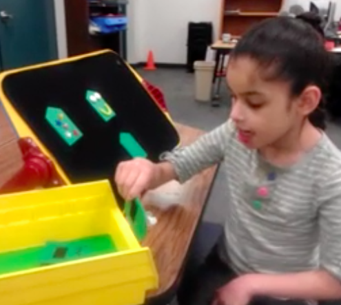 Choosing object symbol cards from a yellow bin