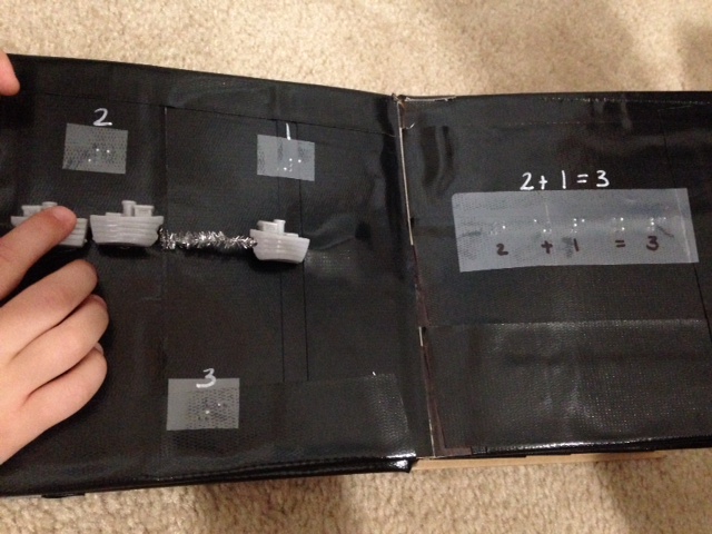 Pages from Addition Book: 3 toy boats and 2 + 1 = 3