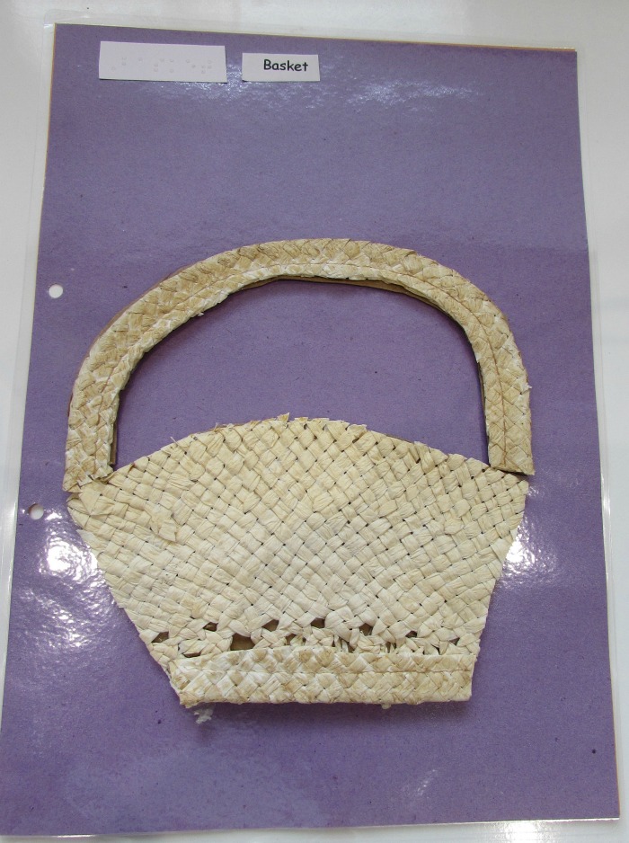 Tactile basket on purple paper