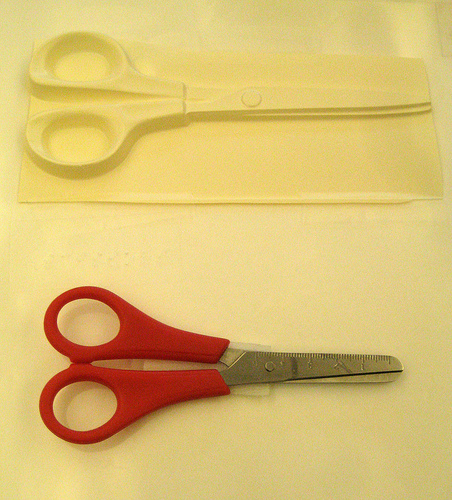 Tactile form of scissors paired with real scissors
