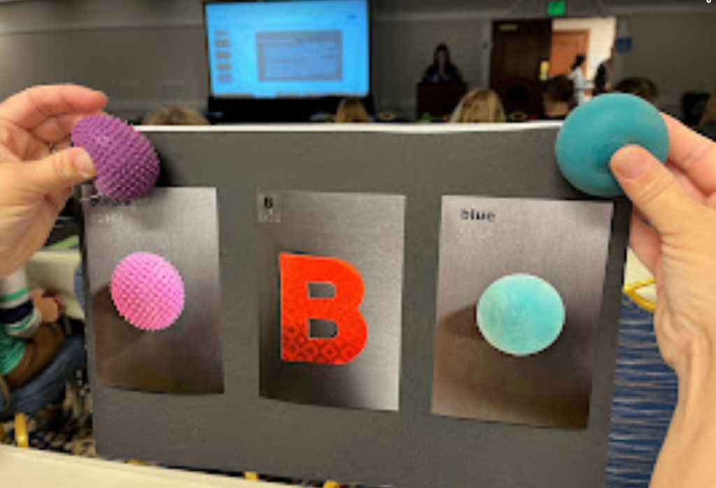 Make and take example that has two different hand held balls with coordinating pictures and the letter "B".