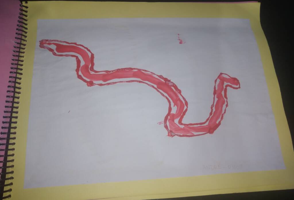 Colored image of a sheet of paper containing a sinuous shape made with red embossed glue to represent a snake.