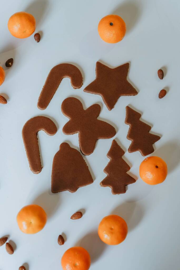 Brown cookies cut in various holiday shapes