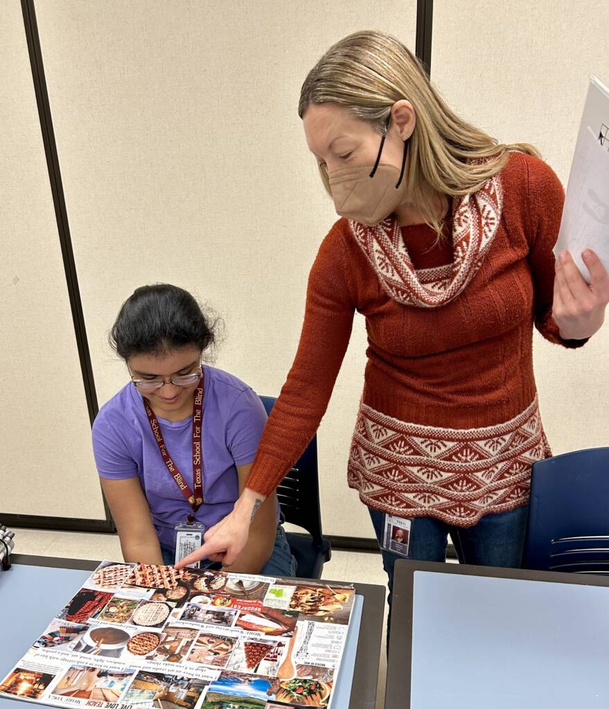 Student and teacher exploring a collage vision board.