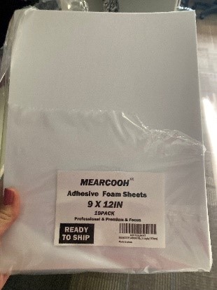 A package of adhesive foam sheets