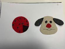 A tactile image of a ladybug and a dog's head