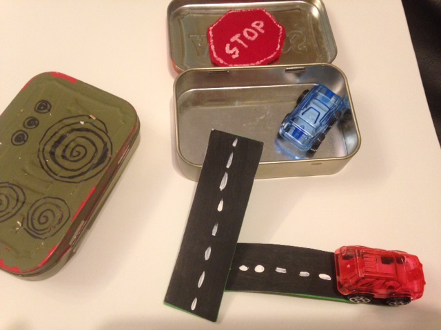 Matchbox cars and race track using Altoid box