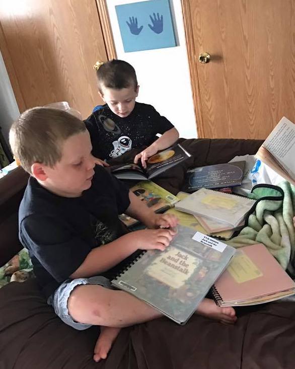 Reading braille books at the library