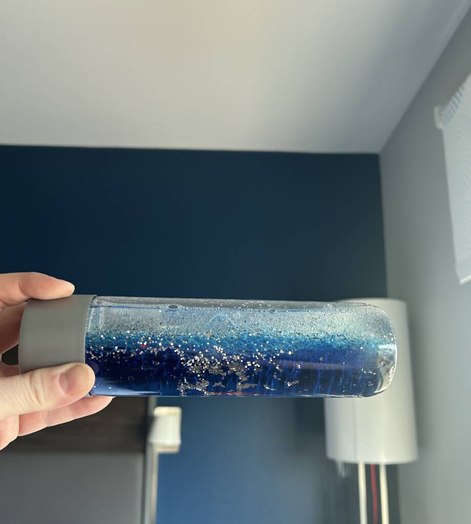 Blue glitter liquid in a bottle