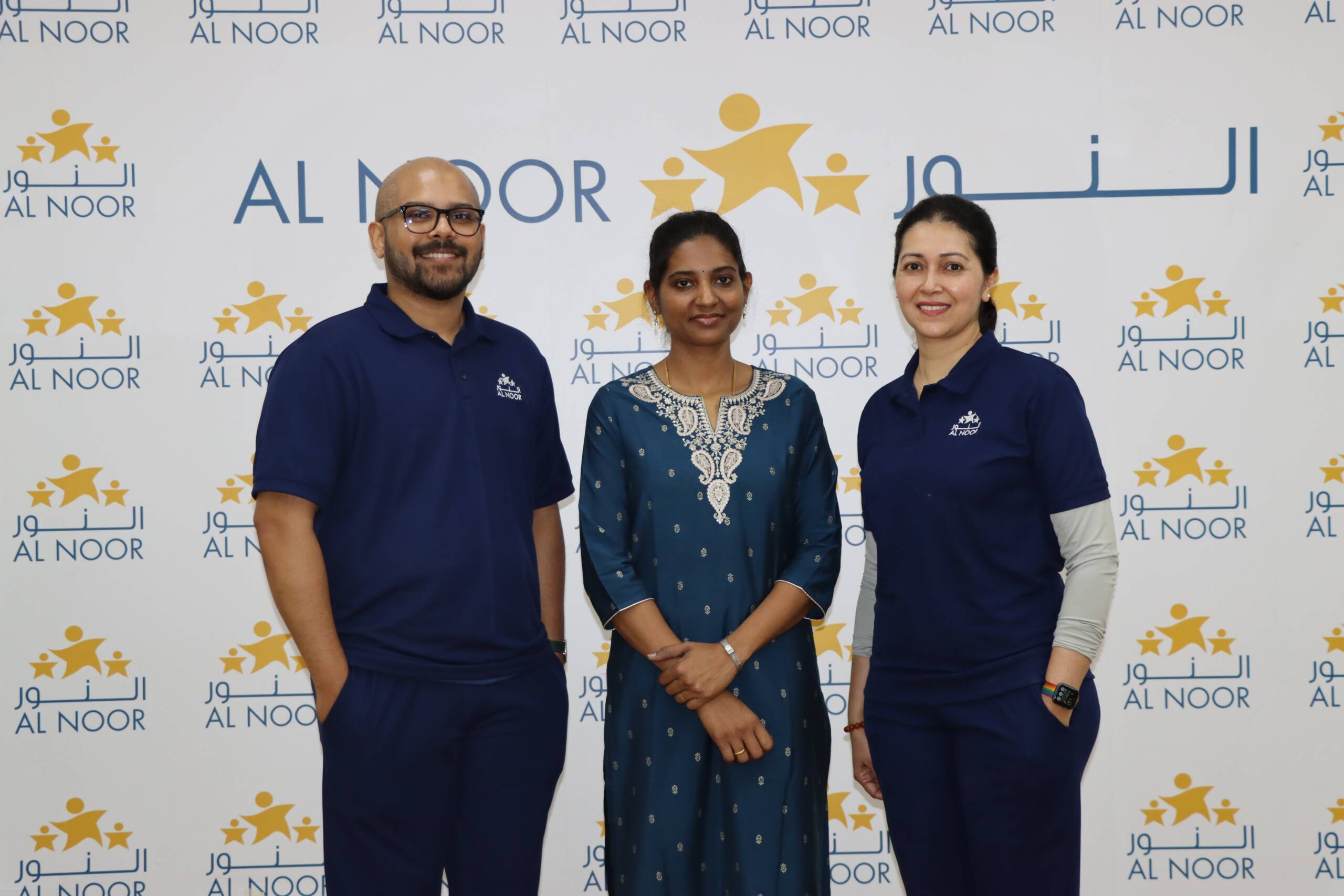 Three members together as a team photo