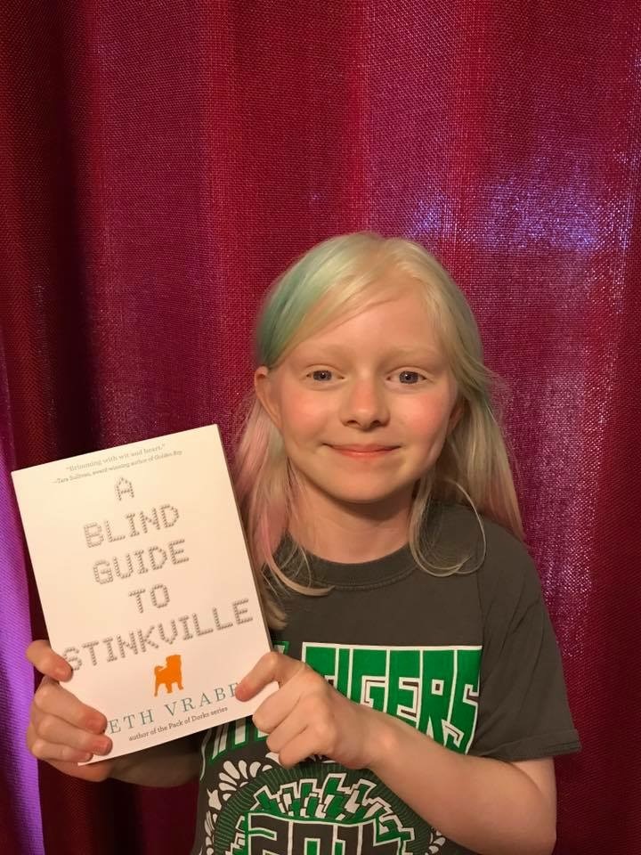 student with a book