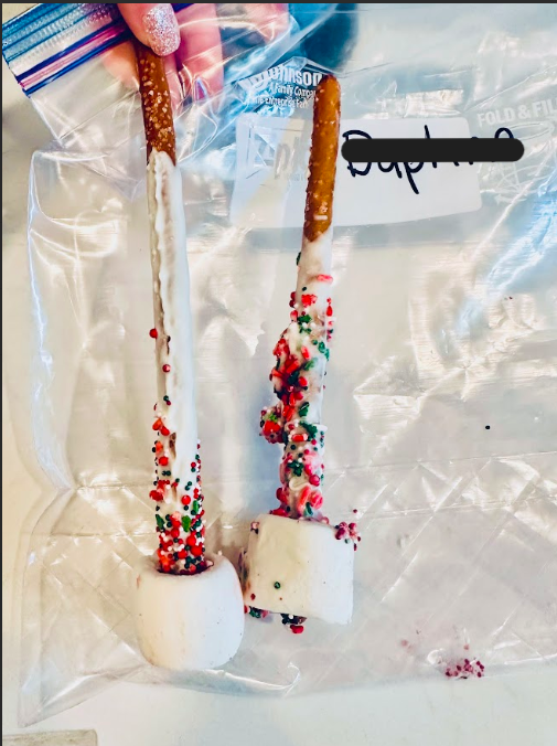 White cane pretzel rod with a marshmallow tip