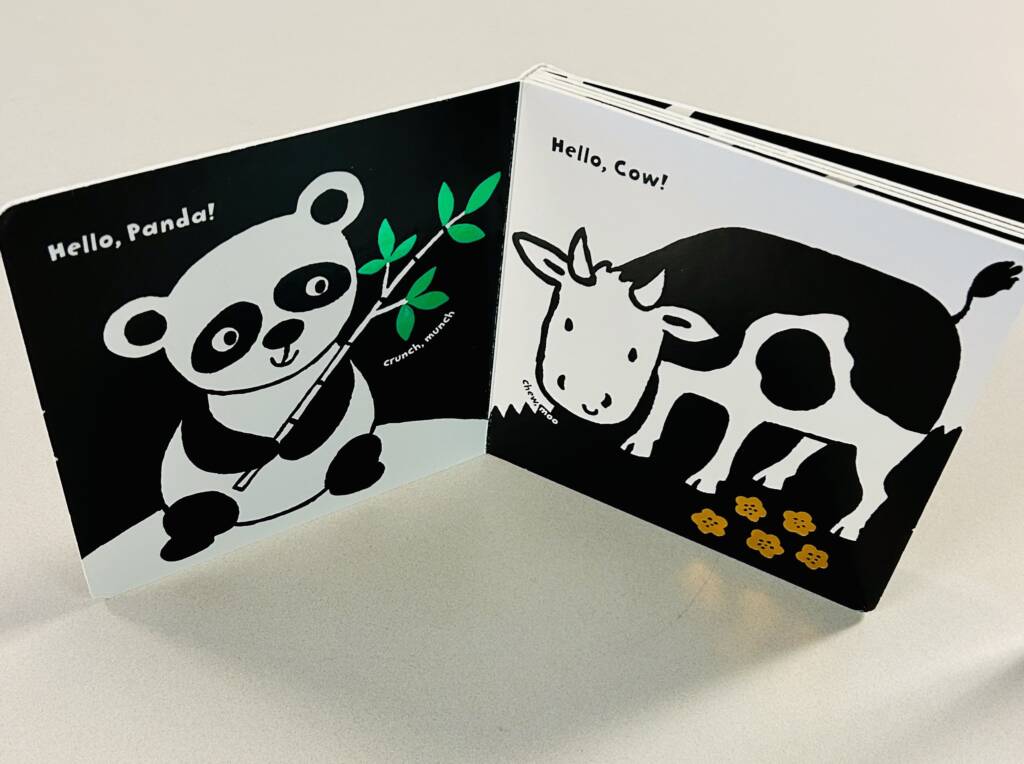 Hello Panda and Hello Cow pages in a book.
