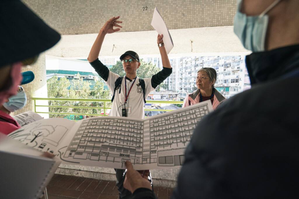 Team members at Beyond Vision providing visual impairment-friendly guided tours of two local Hong Kong communities.