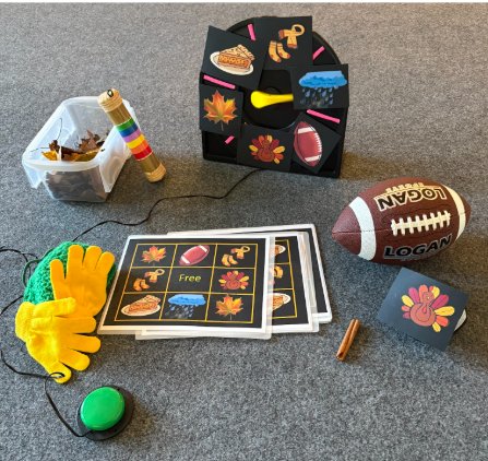 Thanksgiving BINGO cards with adapted spinner, counters and a football on the side.