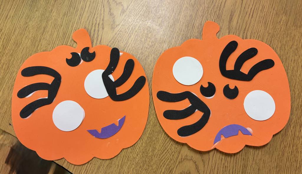 Foam pumpkins with glued silly faces on them.